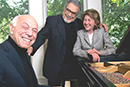 leon fleisher sitting at piano with bob and rheda