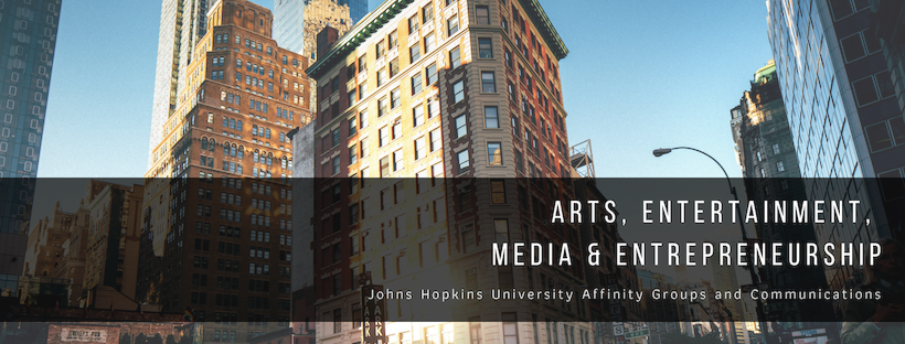 Arts, Entertainment, Media and Entrepreneurship as a block of text in front of an image of a large building