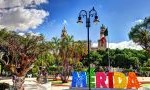 city center with trees and Merida sign